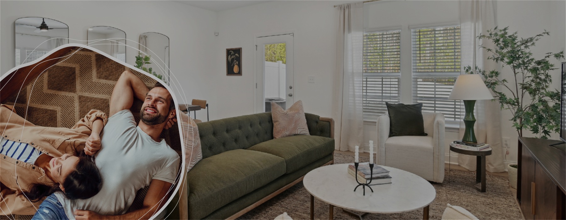 living room with furniture and windows and a couple relaxing together