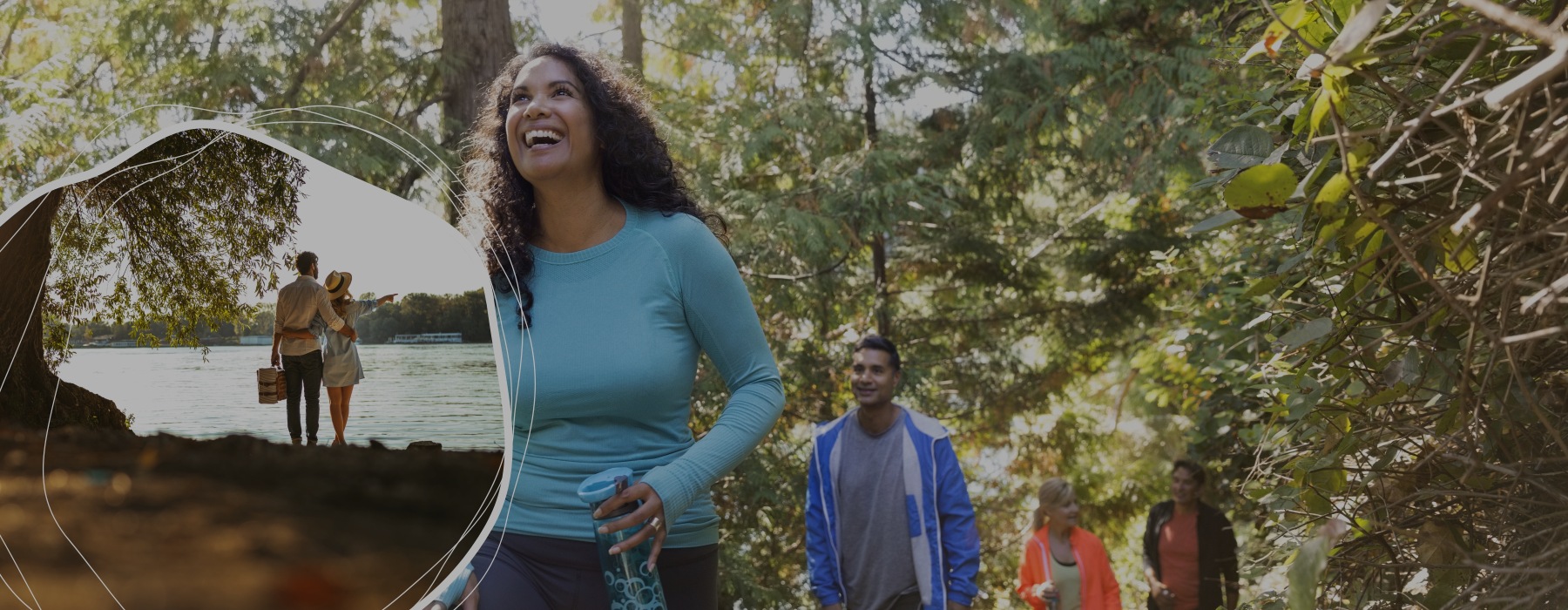 a couple standing by a body of water and people walking in a forest