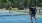 two people playing pickleball